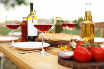 Table set for barbecue party in countryside