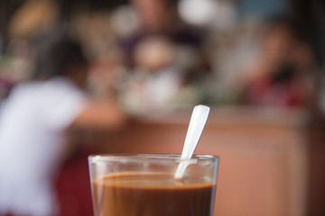 vintage coffee with a coffee shop on the background