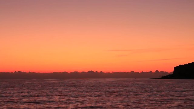 Scenic sunset over sea surface. Greece Peloponnese Lakonias Neo Itylo. Time lapse