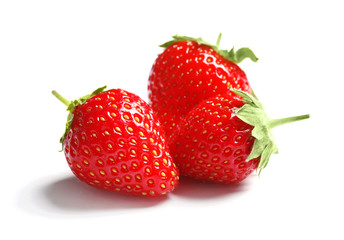 Fresh ripe red strawberries on white background