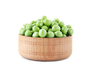 Bowl with green peas on white background