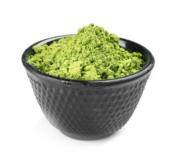 Bowl with powdered matcha tea on white background