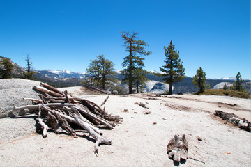 Pile of dead wood at the base of Sub Dome next to Half Dome in Yosemite National Park in California United States