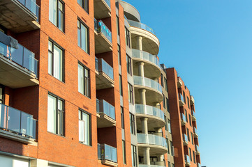 Modern condo buildings with huge windows and balconies in Montreal, Canada. 