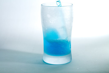 Glass of blue liquid