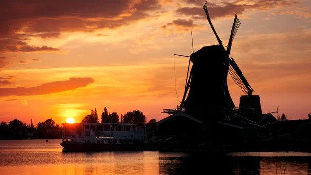 Windmills at Zaanse Schans in Holland on sunset. Zaandam, Nether