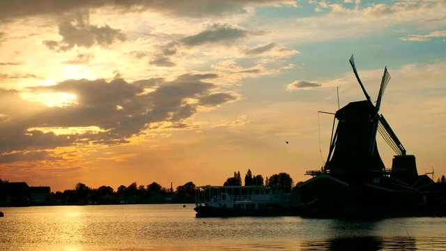 Windmills at Zaanse Schans in Holland on sunset. Zaandam, Nether