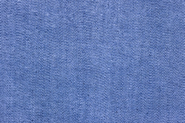 Fototapeta na wymiar Blue denim fabric, cotton jeans texture