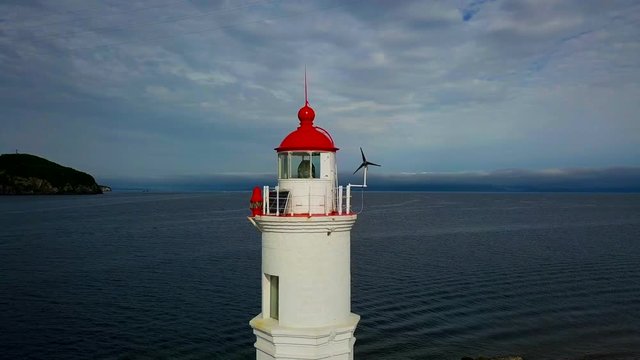 Aerial summer view of the Tokarevskiy lighthouse - one of the oldest lighthouses in the Far East, still an important navigational structure and popular attractions of Vladivostok city, Russia.	