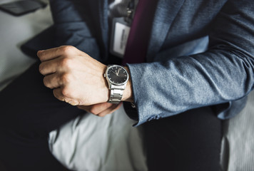 A man putting on a watch