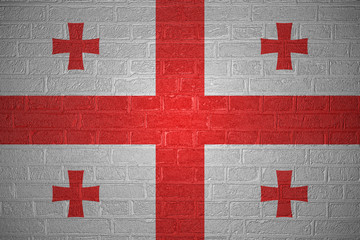 Flag of Georgia on brick wall, 3d illustration