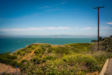 Pacific Ocean in vivid day landscape, San Francisco, USA. Alcatraz Island on background