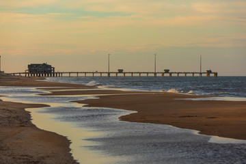 Jennettes pier extending into ocean in the Outer Banks, North Carolina