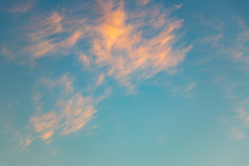 background. beautiful evening blue sky with orange clouds. defocus