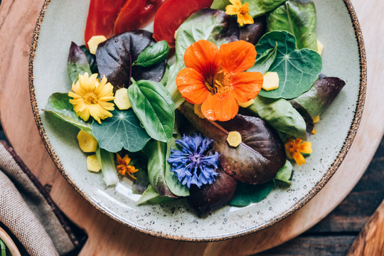 Delicious salad with edible flowers