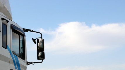 rear view mirror of a running truck