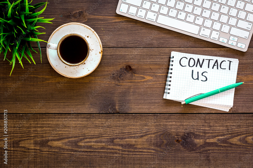Poster template for contacts, background for contact information. lettering contact us in notebook on offic