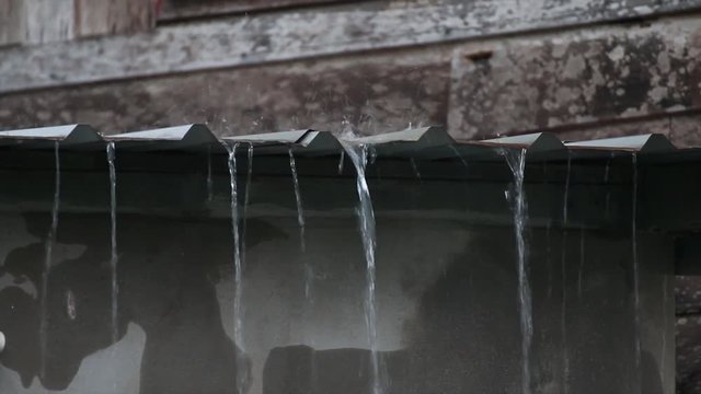 Rain on old zinc roof rainy season    