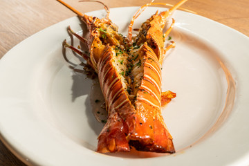 lobster close up and opened on neutral plate