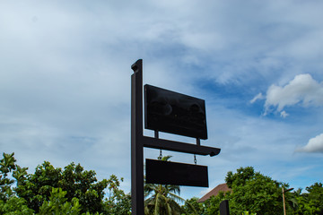 The wooden column label in garden