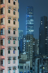 Fototapeta na wymiar Modern and old buildings in Hong Kong city at night