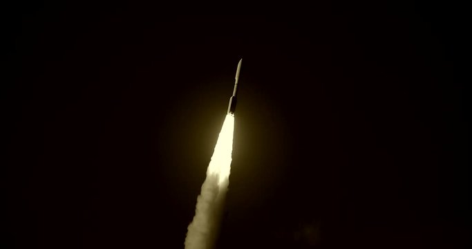 Tracking shot of missile flying into space