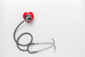 Fototapeta na wymiar red heart and stethoscope isolated on white background , Health Care concept.