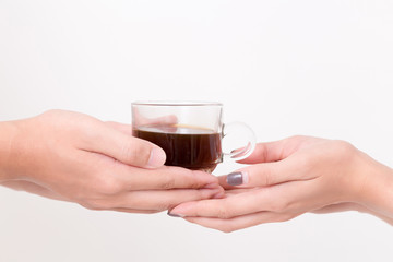 Close up of the arista giving cup of coffee to young asia woman. . Isolated on white background. Studio lighting. Concept for healthy.
