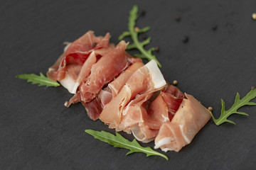 Italian prosciutto crudo or jamon. Raw ham.