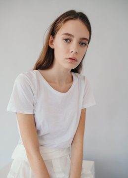 Studio fashion portrait of gorgeous teen girl