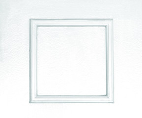 blank photo frames on wooden white clolred wall