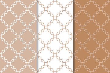 Set of geometric ornaments. Brown and white seamless patterns