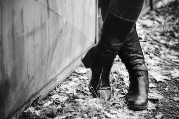 Boots Crossed Legs - Black and White