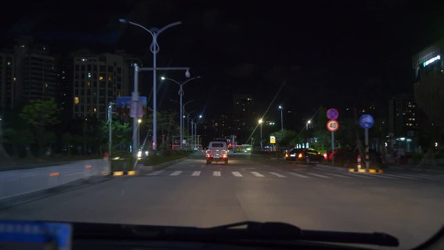night illuminated zhuhai city traffic street road trip front pov panorama 4k china
