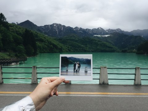 A photo of a photo in front of a lake