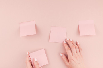 Woman hands with paper stickers