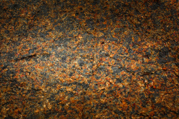 Background Stone granite sea on the beach Phuket Thailand.