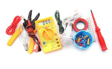 Electrician's supplies on white background