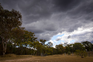 Fototapeta na wymiar Dry, drought conditions and landscape in Stanthorpe on a stormy afternoon