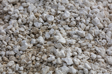 White gravel stones as an abstract background