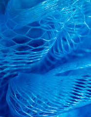 Blue synthetic sponge as an abstract background