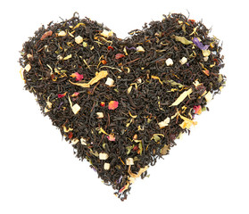Heart made with dry tea leaves on white background, top view