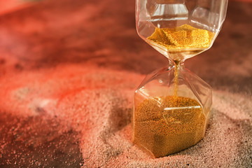 Hourglass on sand. Time management concept