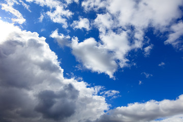 Clouds on a blue sky as a background