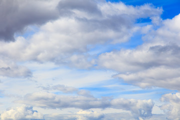 Clouds on a blue sky as a background