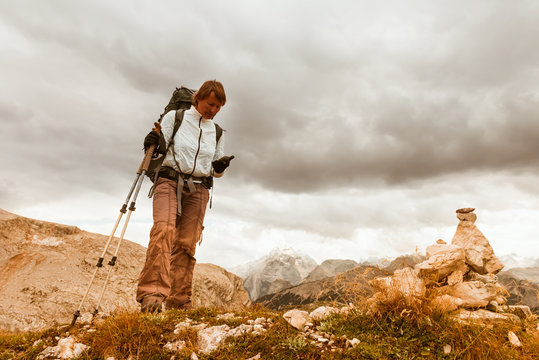 hiker young woman with GPS navigator