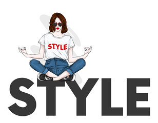 A beautiful girl in jeans and a top is sitting in a stylish inscription in a yoga pose. Vector illustration. Clothes and accessories. Print on clothes. Fashion & Style. Fashionable look.