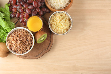 Various healthy food on wooden table
