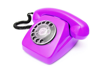 Purple retro telephone isolated on white background