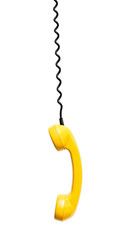 Yellow retro telephone tube isolated on white background.